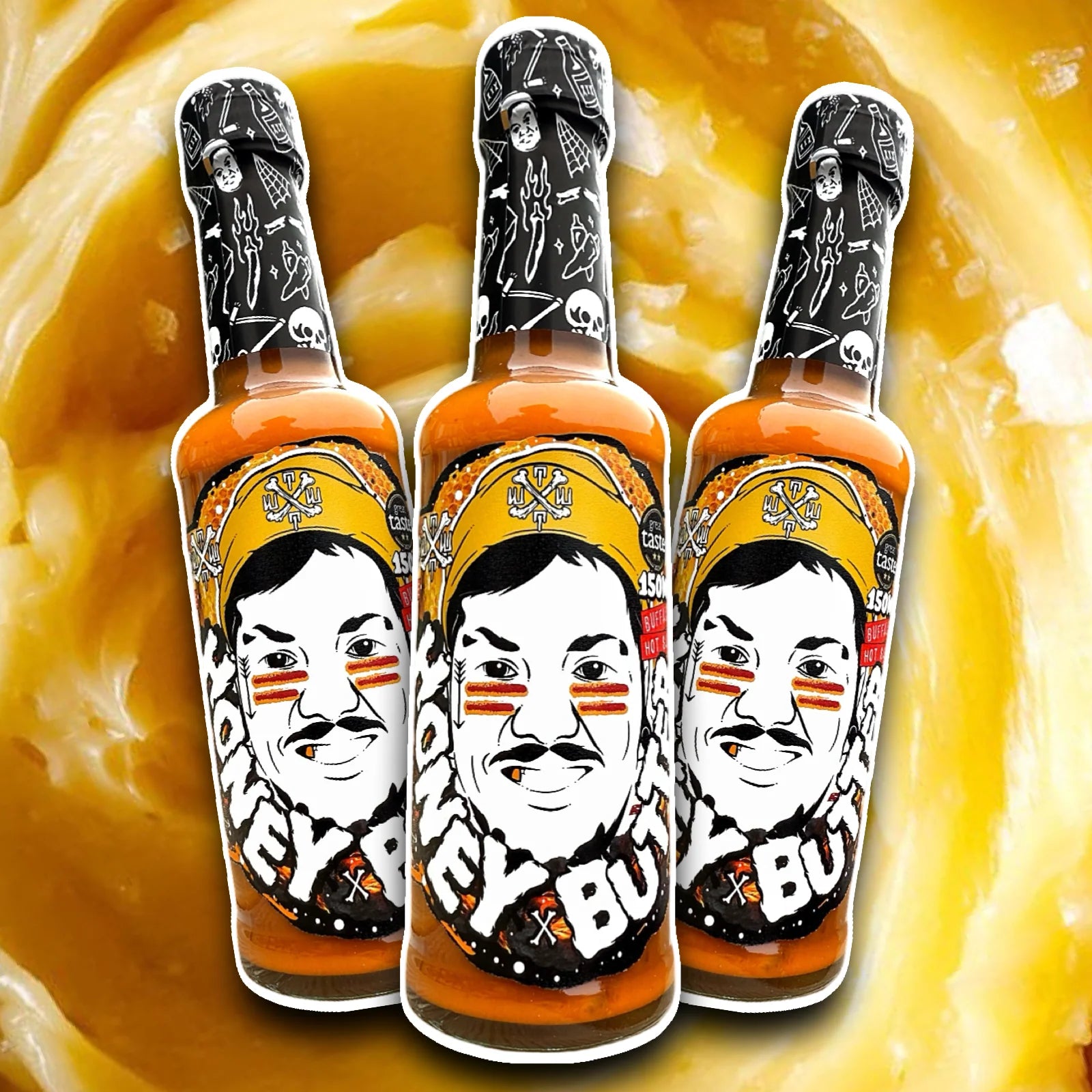 Three Tubby Tom's Honey Butter Buffalo hot sauce bottles on a yellow background