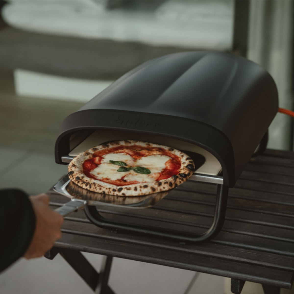 Enders Paco Pizza Oven with a cooked pizza