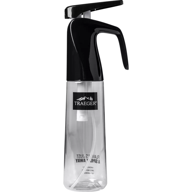 Clear spray bottle with black nozzle and Traeger logo on a white background